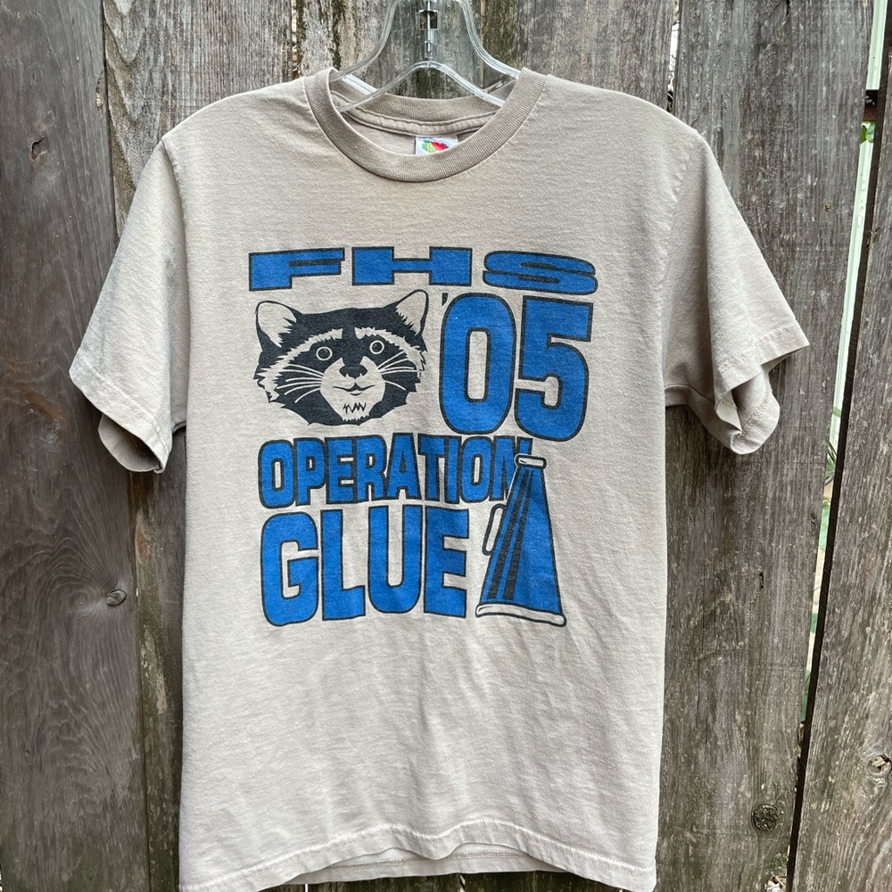 Vintage Beige High School T-Shirt with Racoon & Blue Graphic